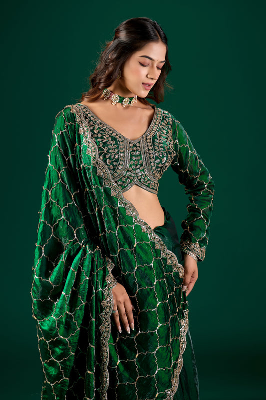 Elegant green silk saree with rose gold cutdana embroidery from Kanyaari's Barsana collection, showcasing intricate design details.
