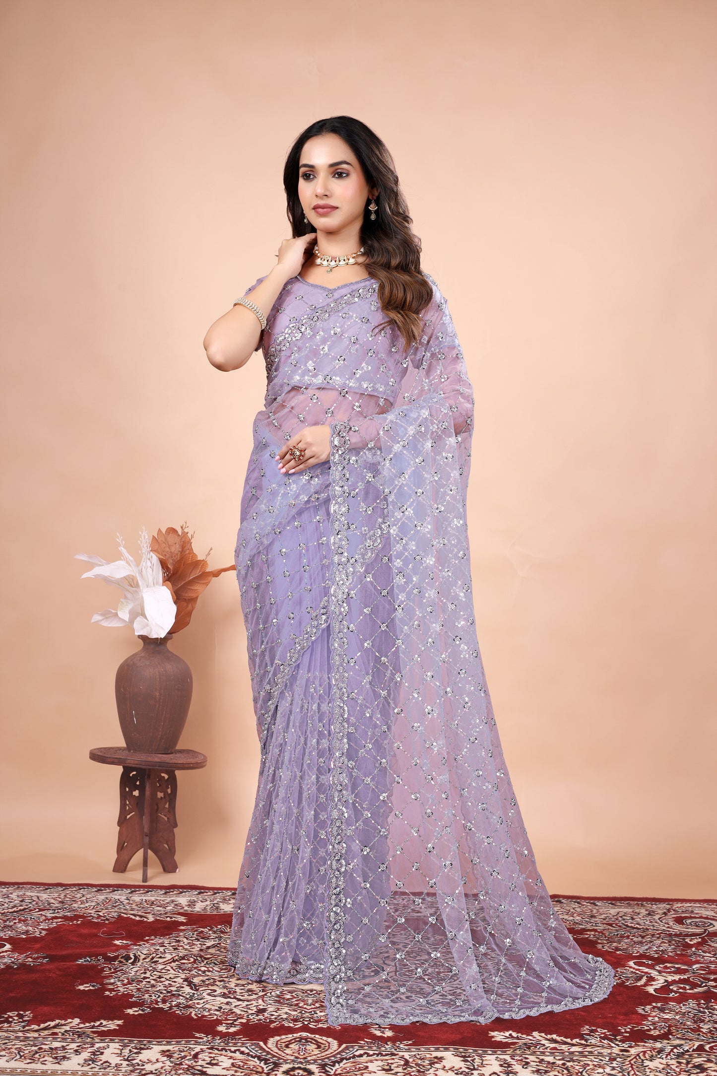 Cross Stylish Green Net saree with Cutdana Work