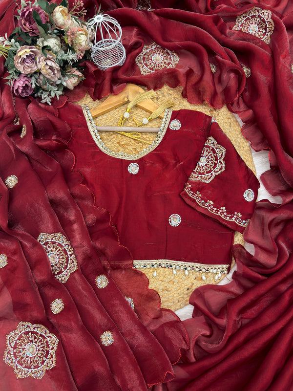 Kanyaari designer Fendy silk saree with heavy embroidery and matching unstitched blouse draped elegantly on a mannequin.