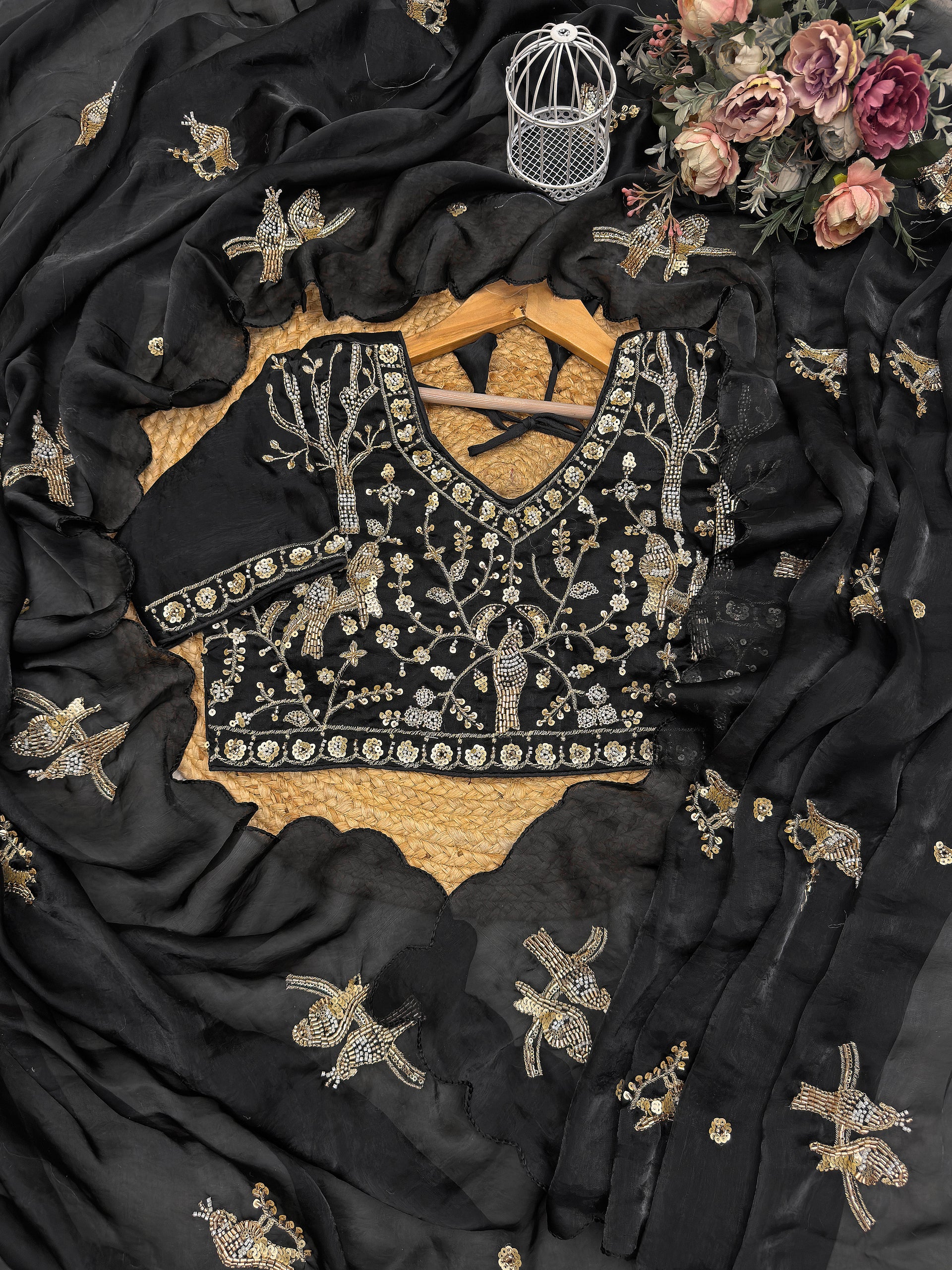 Black Fendy silk saree by Kanyaari featuring rose gold handwork embroidery and elegant drape for traditional occasions.