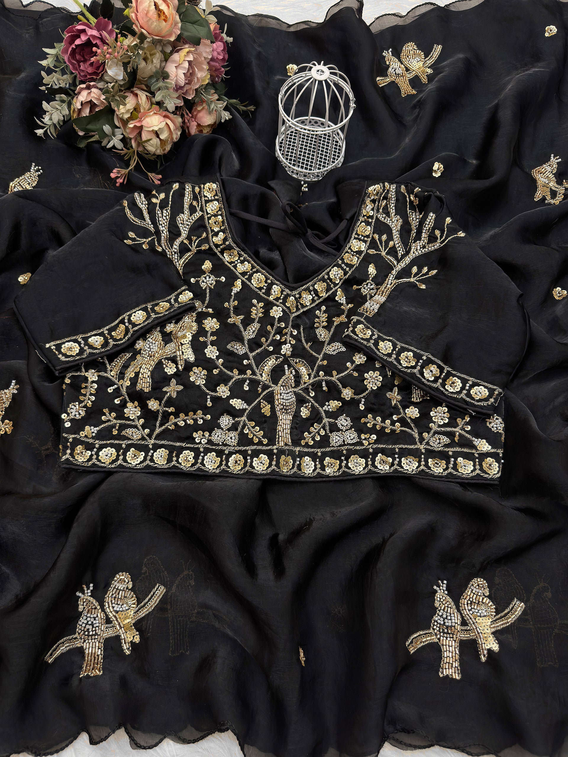 Black Fendy silk saree by Kanyaari featuring elegant rose gold handwork embroidery and intricate detailing.