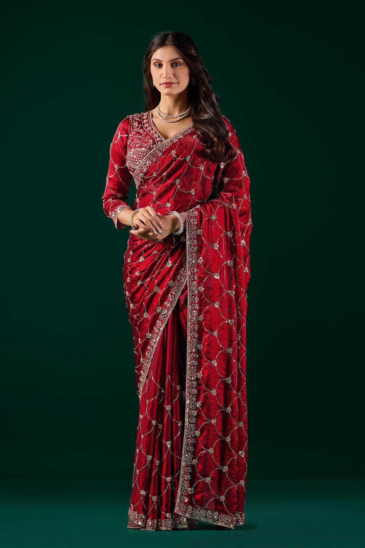 Kanyaari Rashmika luxury silk wine saree with rose gold cutdana work, showcasing intricate embroidery and elegant drape.