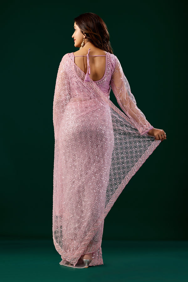 Pink Kanyaari saree with heavy cutdana embroidery and net fabric, featuring intricate embroidery details.