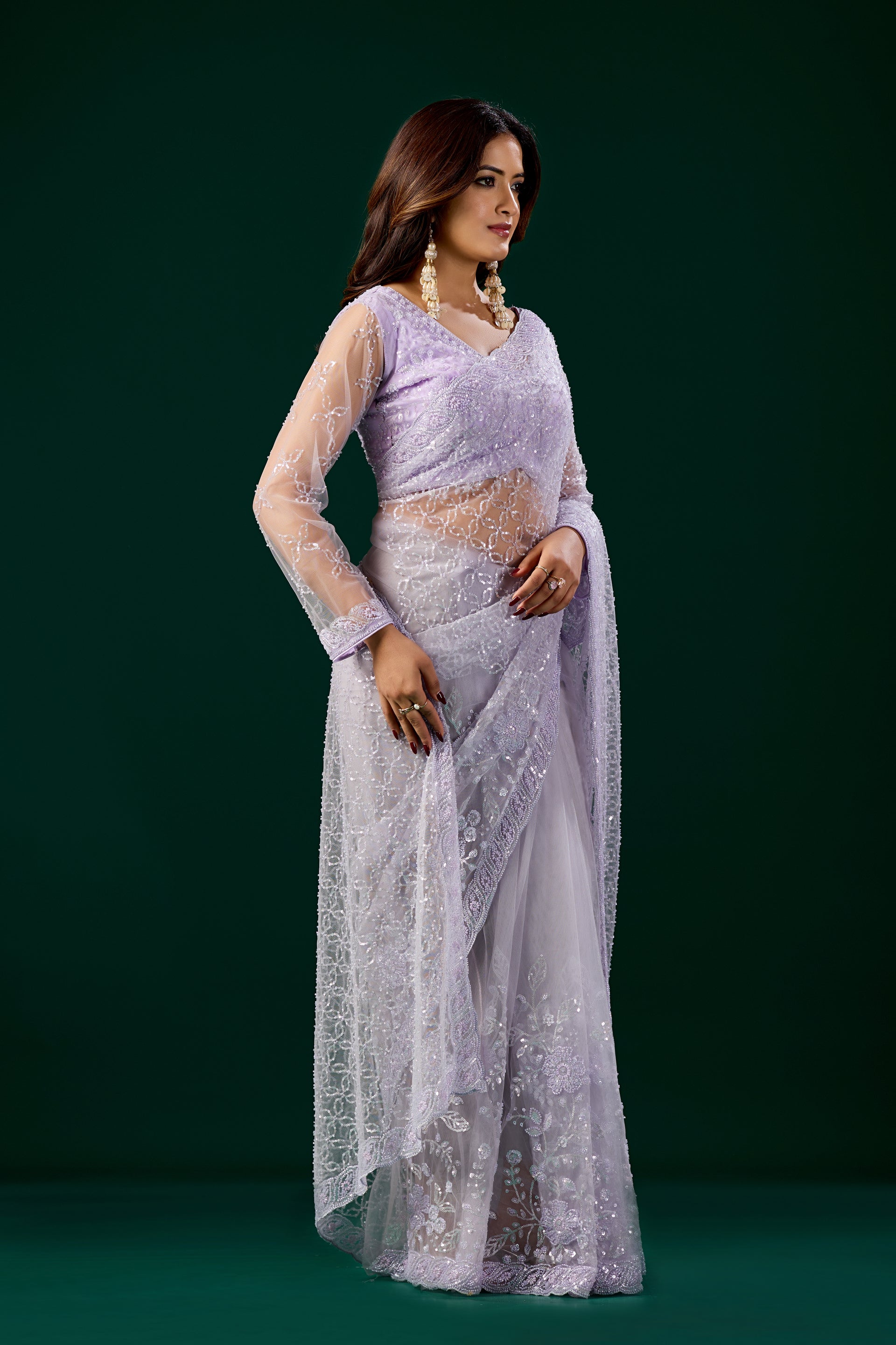 Purple Kanyaari saree with heavy cutdana embroidery and net fabric, featuring intricate embroidery details.