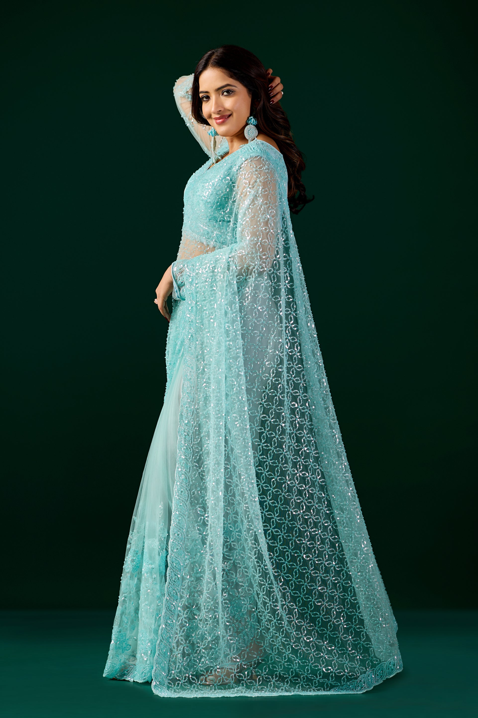 Blue Kanyaari saree with heavy Cutdana embroidery and net fabric, featuring intricate embroidery work.