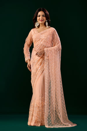 Orange Kanyaari saree with heavy cutdana embroidery and net fabric, featuring intricate embroidery details.