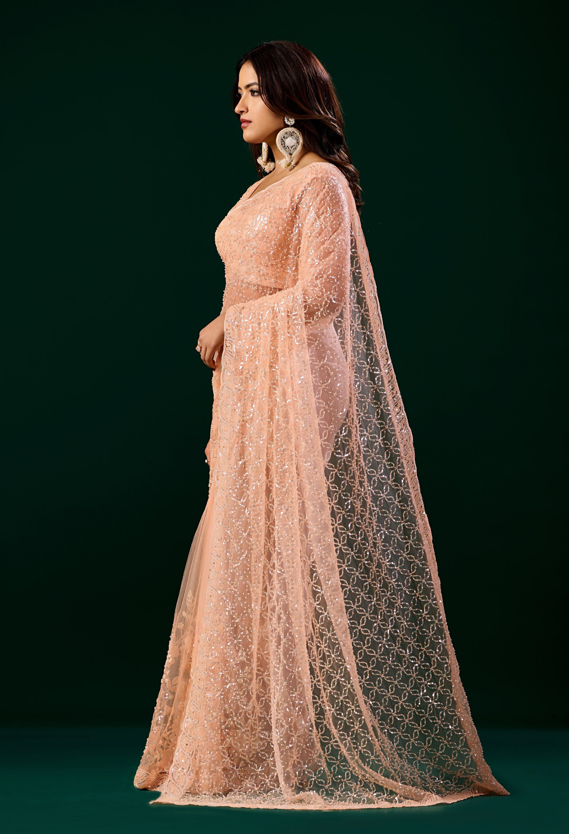 Orange embroidered saree with heavy cutdana work, stylish net fabric, from Kanyaari's Deepika collection.