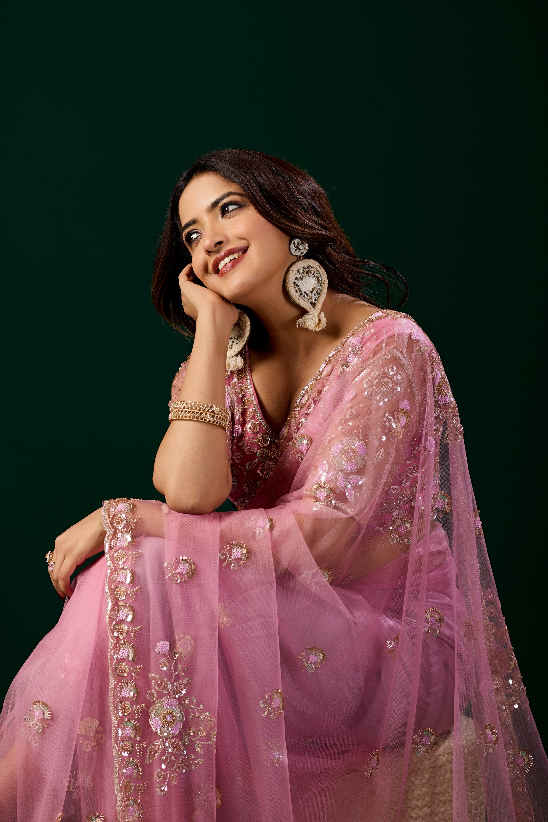 Pink Kanyaari Styalish Net saree with heavy Cutdana embroidery, featuring intricate work and a flowing drape.