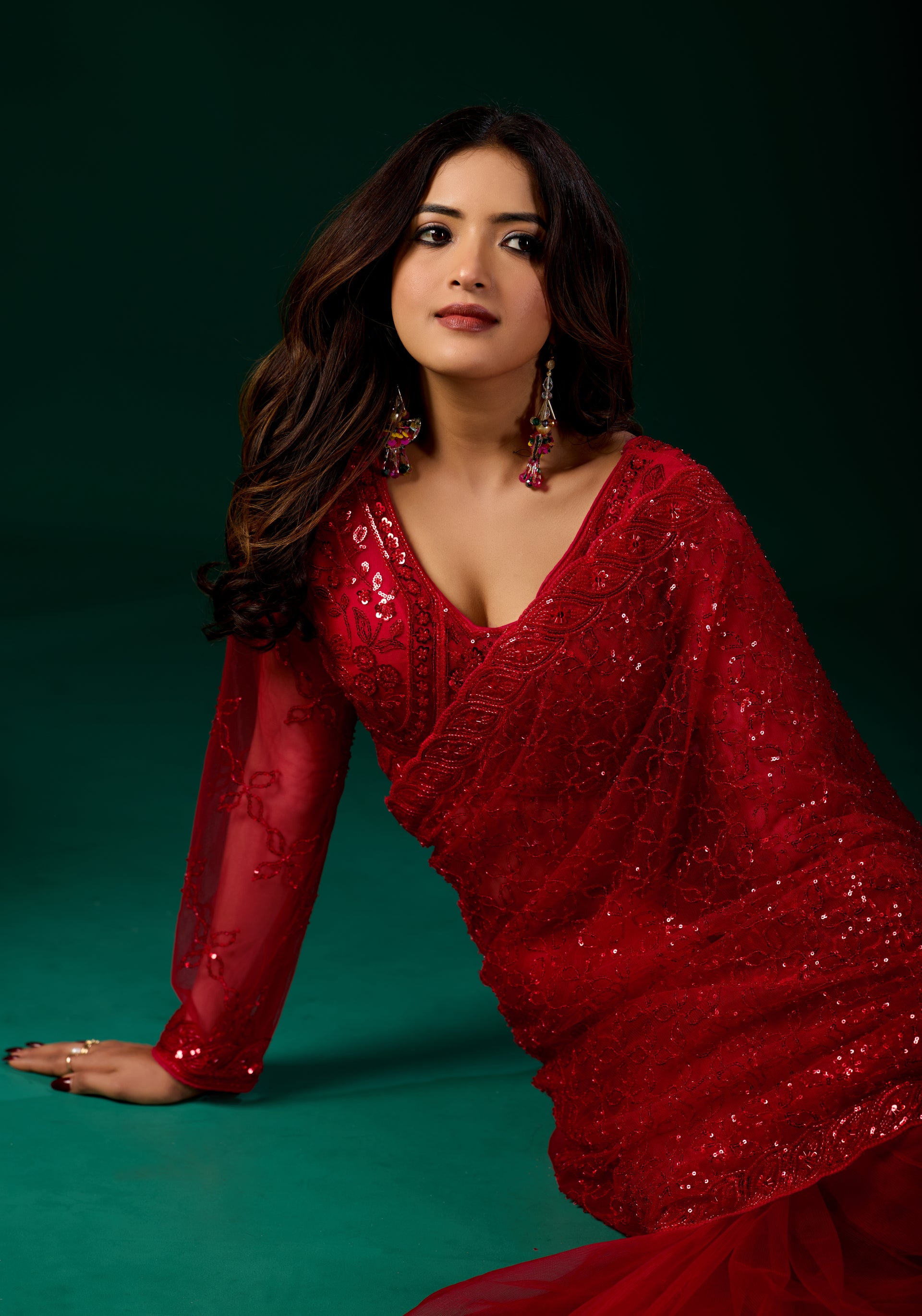 Red cutdana saree with intricate border and unstitched matching blouse, traditional Indian attire by Kanyaari.