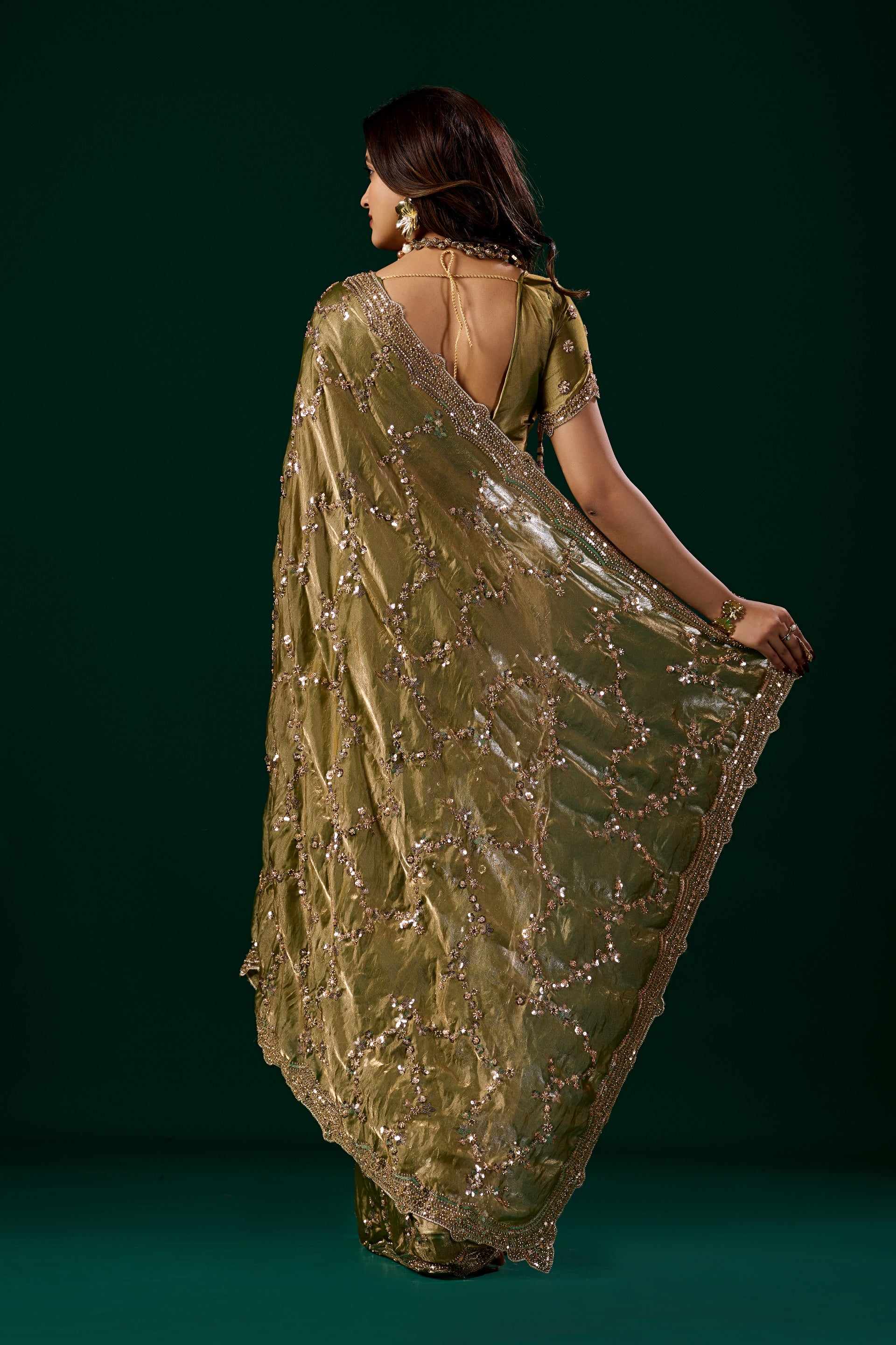 Kanyaari premium silk Mehndi saree with rose gold cutdana embroidery, showcasing intricate craftsmanship and elegant design.