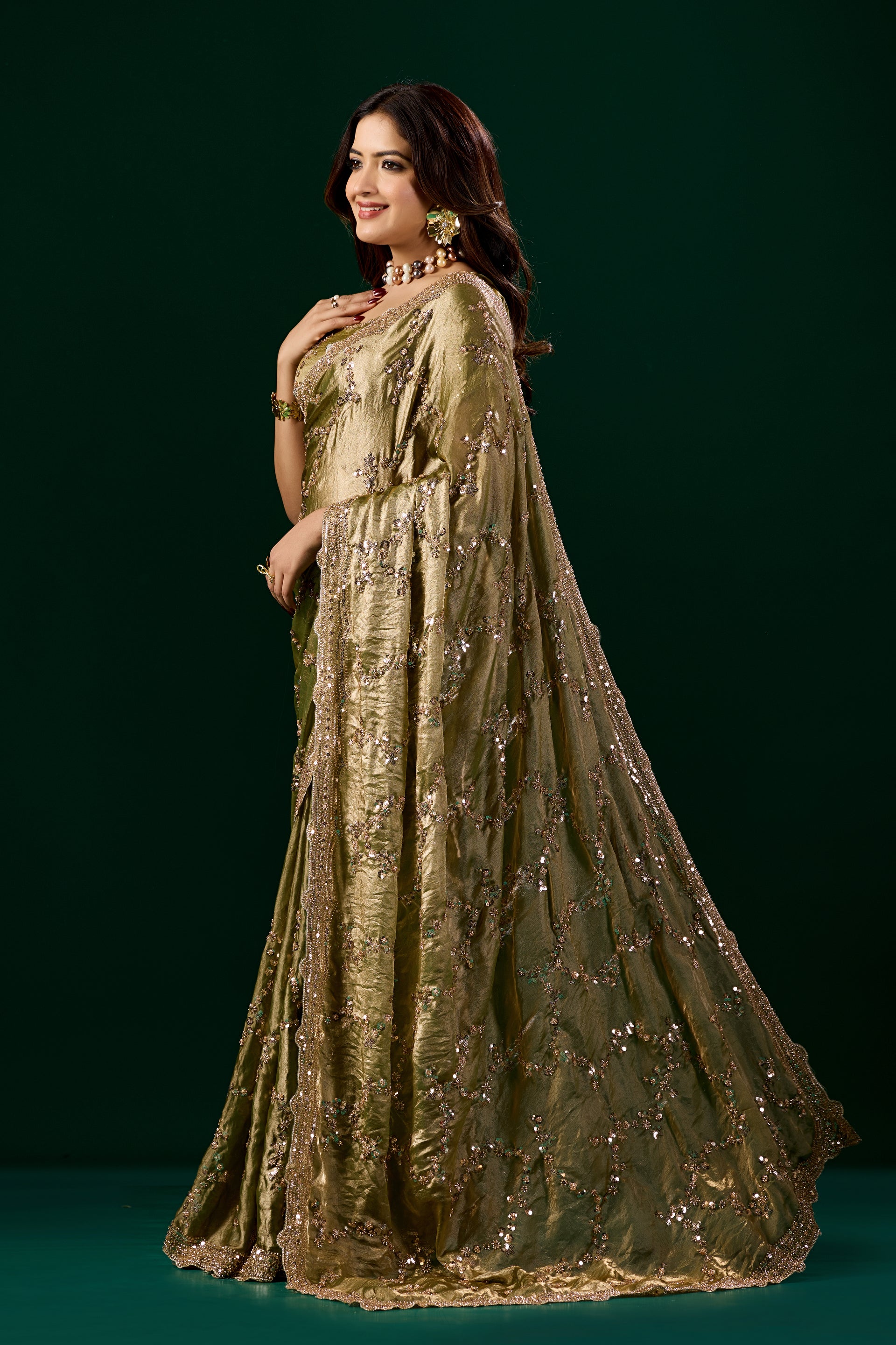 Kanyaari premium silk Mehndi saree with rose gold cutdana work, showcasing intricate embroidery and elegant drape.