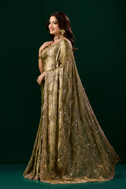 Kanyaari premium silk Mehndi saree with rose gold cutdana work, showcasing intricate embroidery and elegant drape.