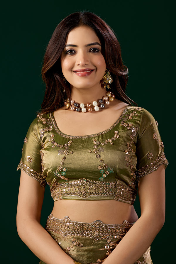 Kanyaari premium silk Mehndi saree with intricate rose gold cutdana work, showcasing elegant traditional craftsmanship.