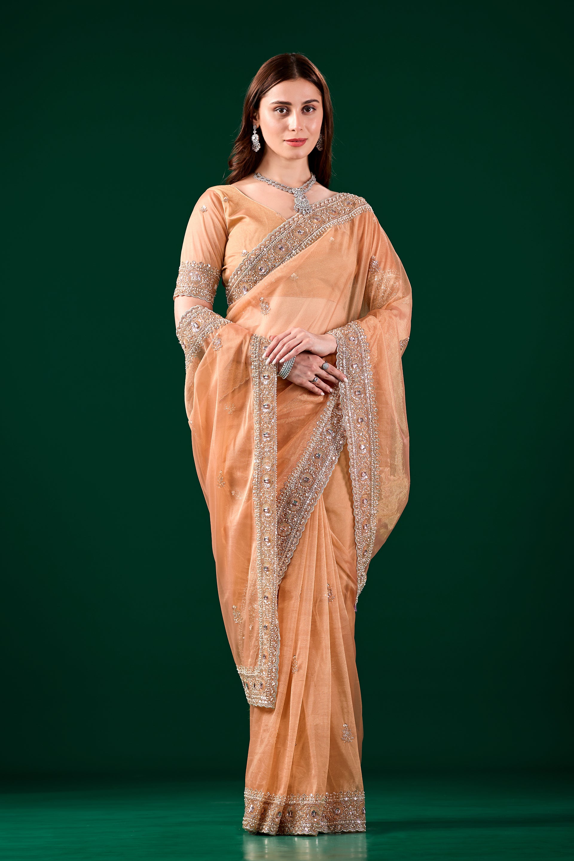 Orange Kundan Premium Silk saree with rose gold cutdana work from Kanyaari, featuring intricate embroidery and traditional design.