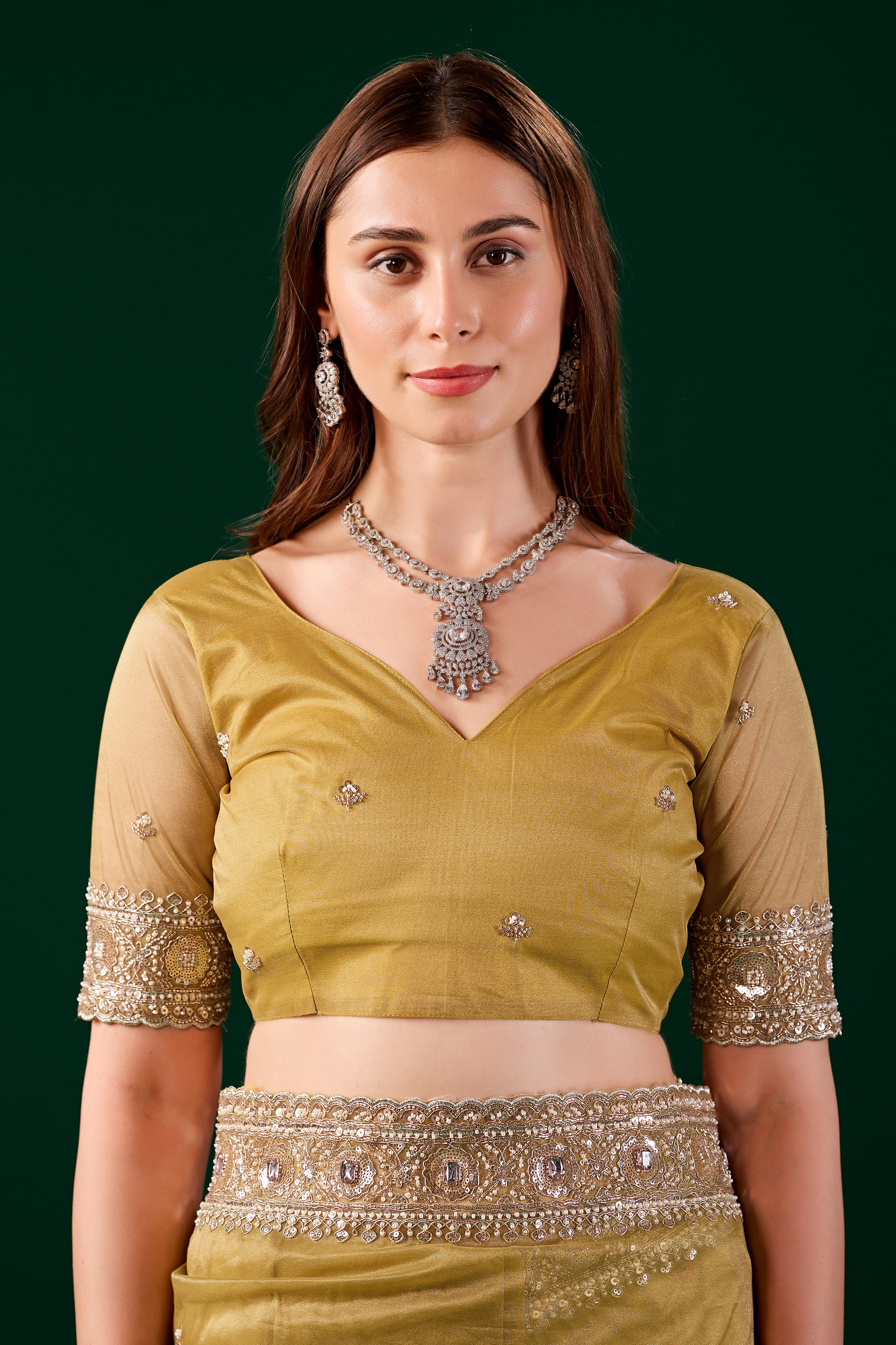 Yellow Kundan Premium Silk saree by Kanyaari with rose gold cutdana work and intricate embroidery on the fabric.