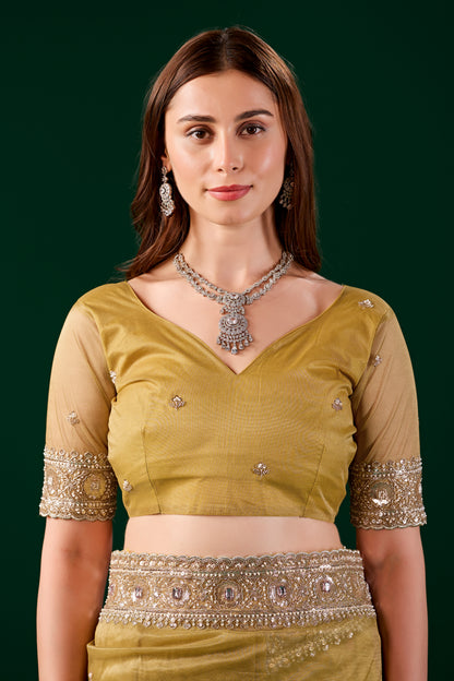 Yellow Kundan Premium Silk saree by Kanyaari with rose gold cutdana work and intricate embroidery on the fabric.