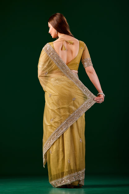 Kanyaari Kundan premium silk yellow saree with intricate rose gold cutdana work, traditional Indian attire with elegant drape.