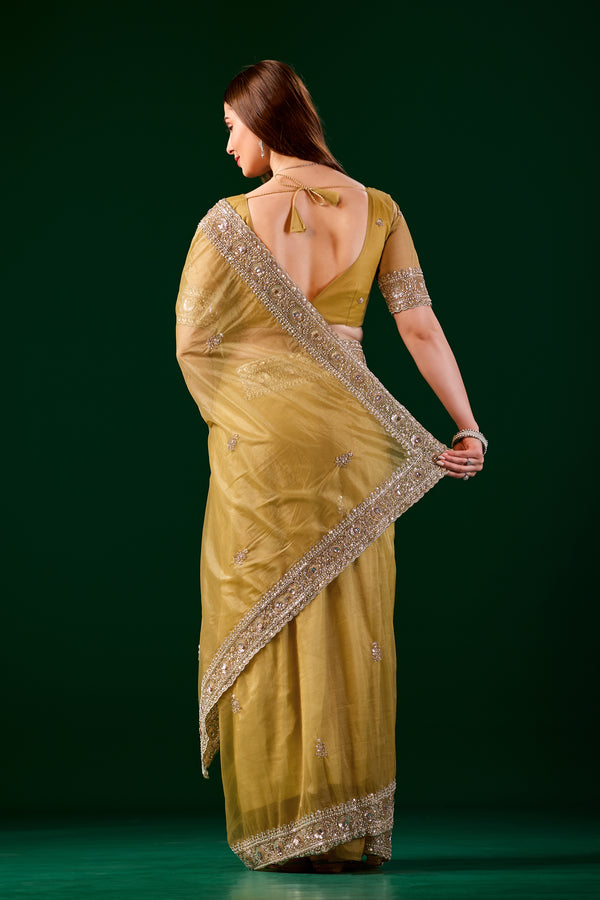 Kanyaari Kundan premium silk yellow saree with intricate rose gold cutdana work, traditional Indian attire with elegant drape.