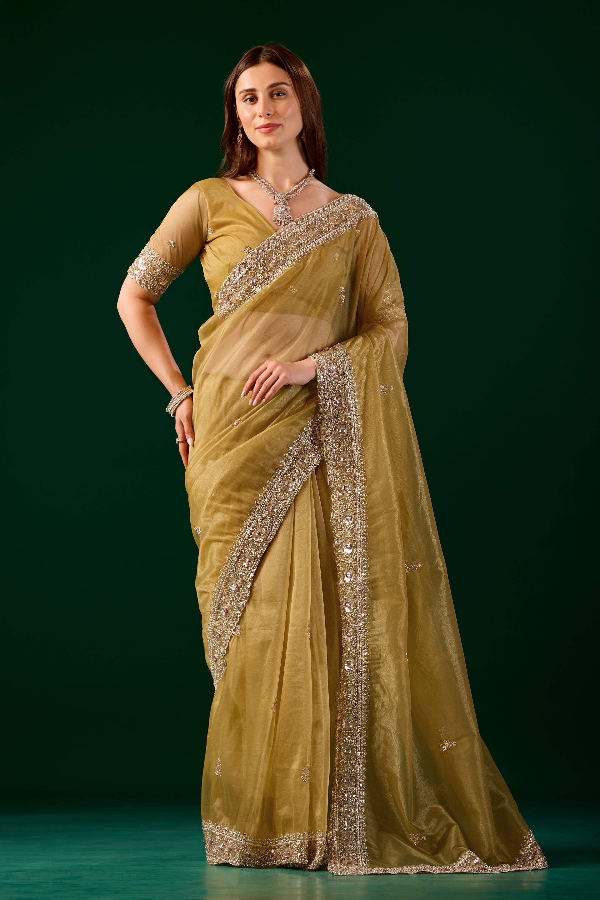 Kanyaari Kundan Premium Silk Yellow Saree with intricate rose gold cutdana work and traditional design.