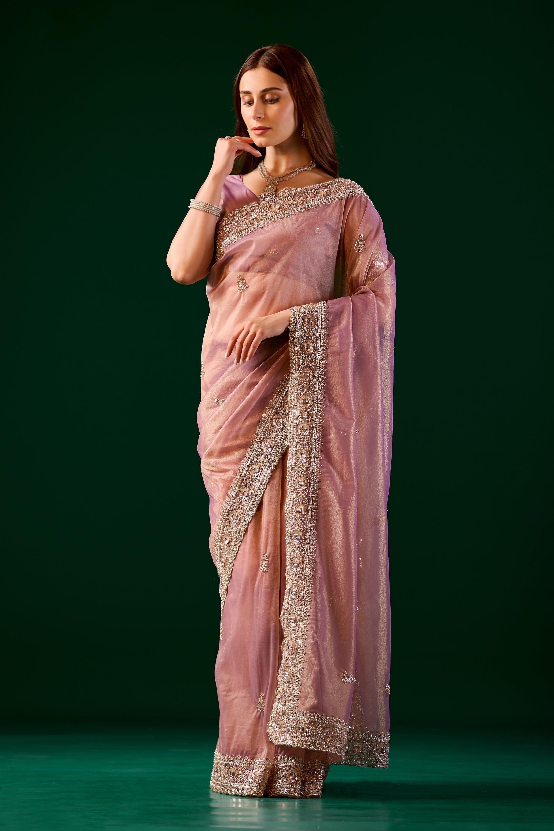 Kanyaari Kundan premium pink silk saree with rose gold cutdana work, showcasing intricate embroidery and traditional elegance.