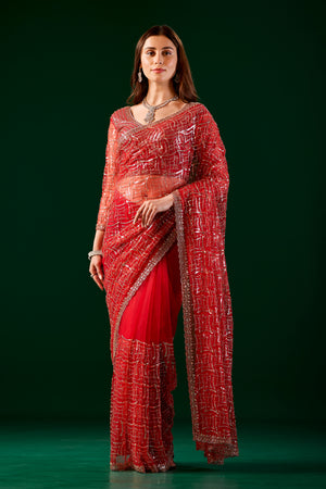 Red Kanyaari saree with heavy cutdana embroidery and net fabric, featuring intricate embellishments and traditional design.