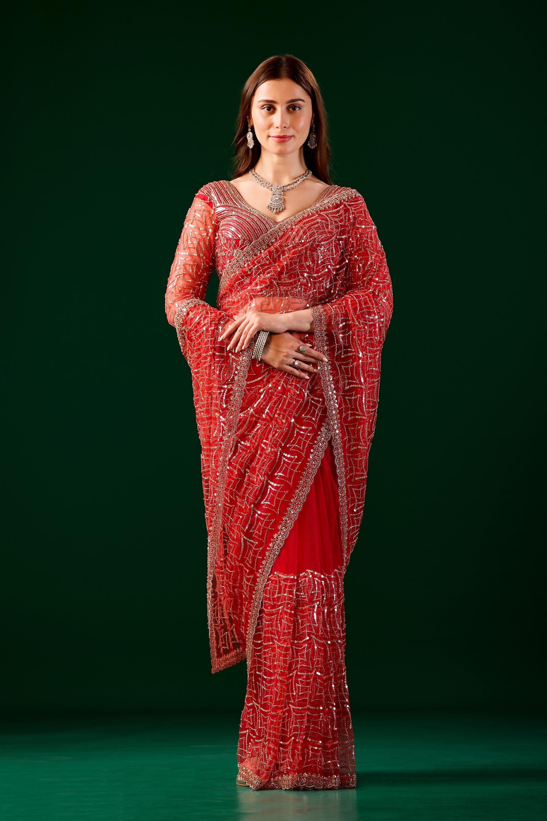 Kanyaari Stylish Net Red Saree with Heavy Cutdana Embroidery, featuring intricate design and elegant drape.