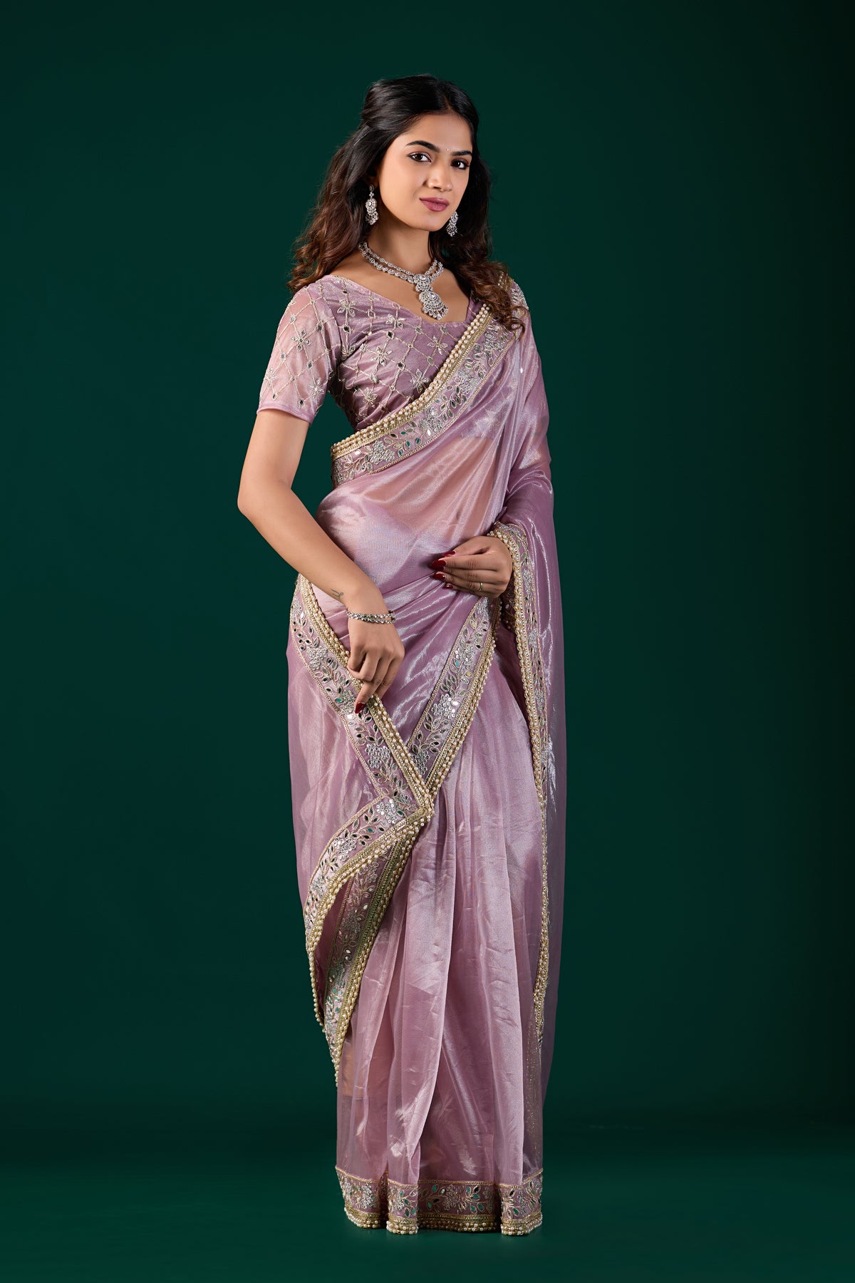 Kanyaari premium silk lavender saree with intricate rose gold cutdana embroidery, showcasing elegant traditional craftsmanship.