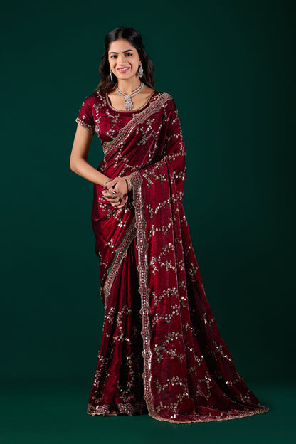 Nakhrali premium silk maroon saree by Kanyaari featuring rose gold cutdana work and intricate traditional embroidery.