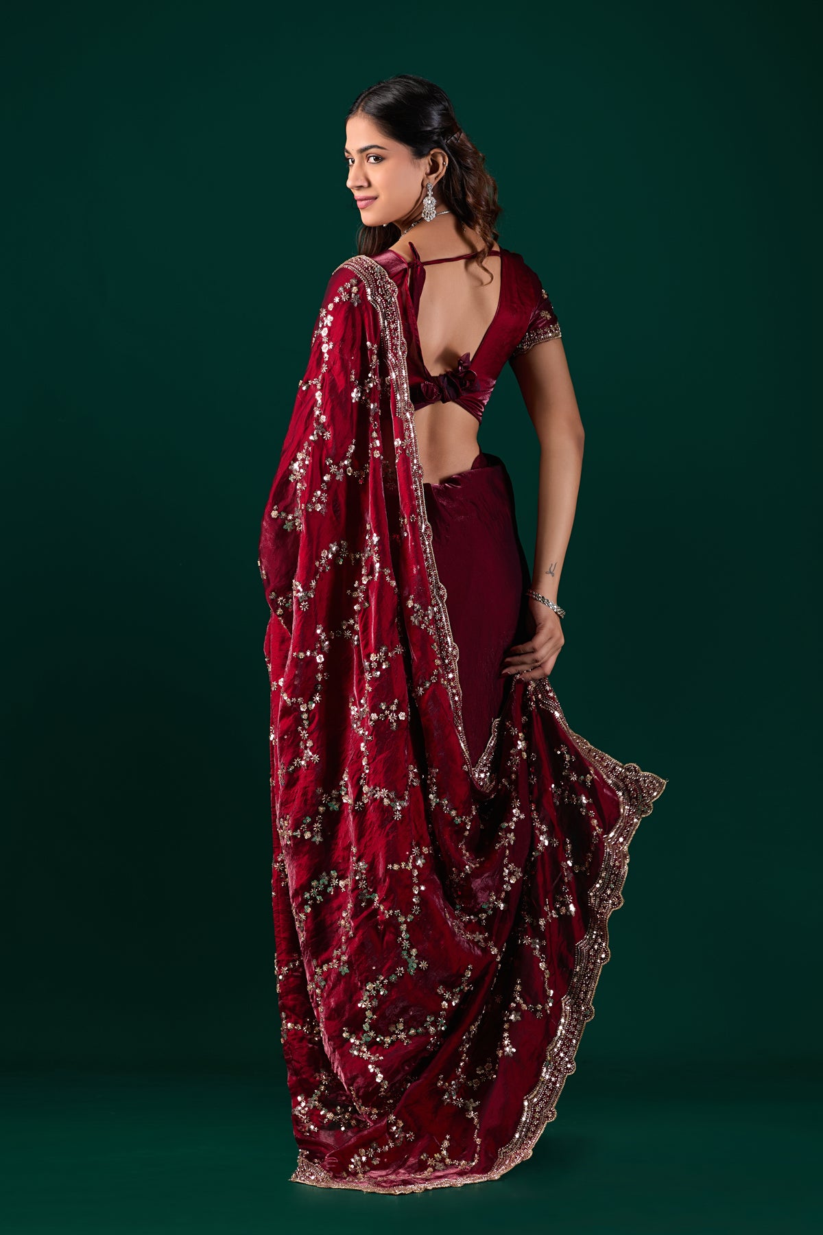 Kanyaari Nakhrali premium maroon silk saree with rose gold cutdana work, intricate embroidery and elegant drape.