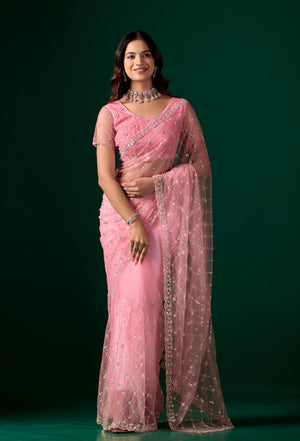 Pink party wear saree with intricate cutdana work from Kanyaari, featuring elegant drape and detailed embroidery.