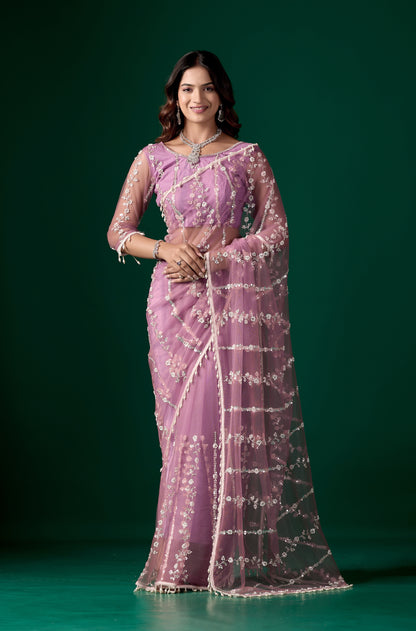Kanyaari Tamannaah purple net saree with intricate cutdana work, featuring detailed embroidery and elegant drape.
