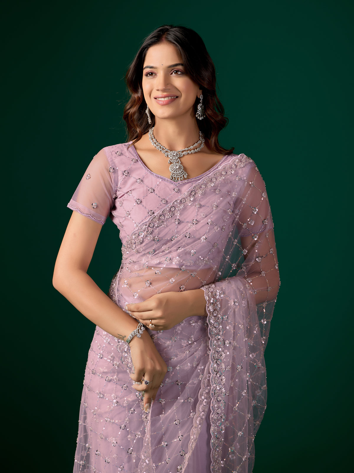 Lavender Kanyaari saree with stylish cutdana work, perfect for party wear, showcasing intricate embroidery and elegant drape.