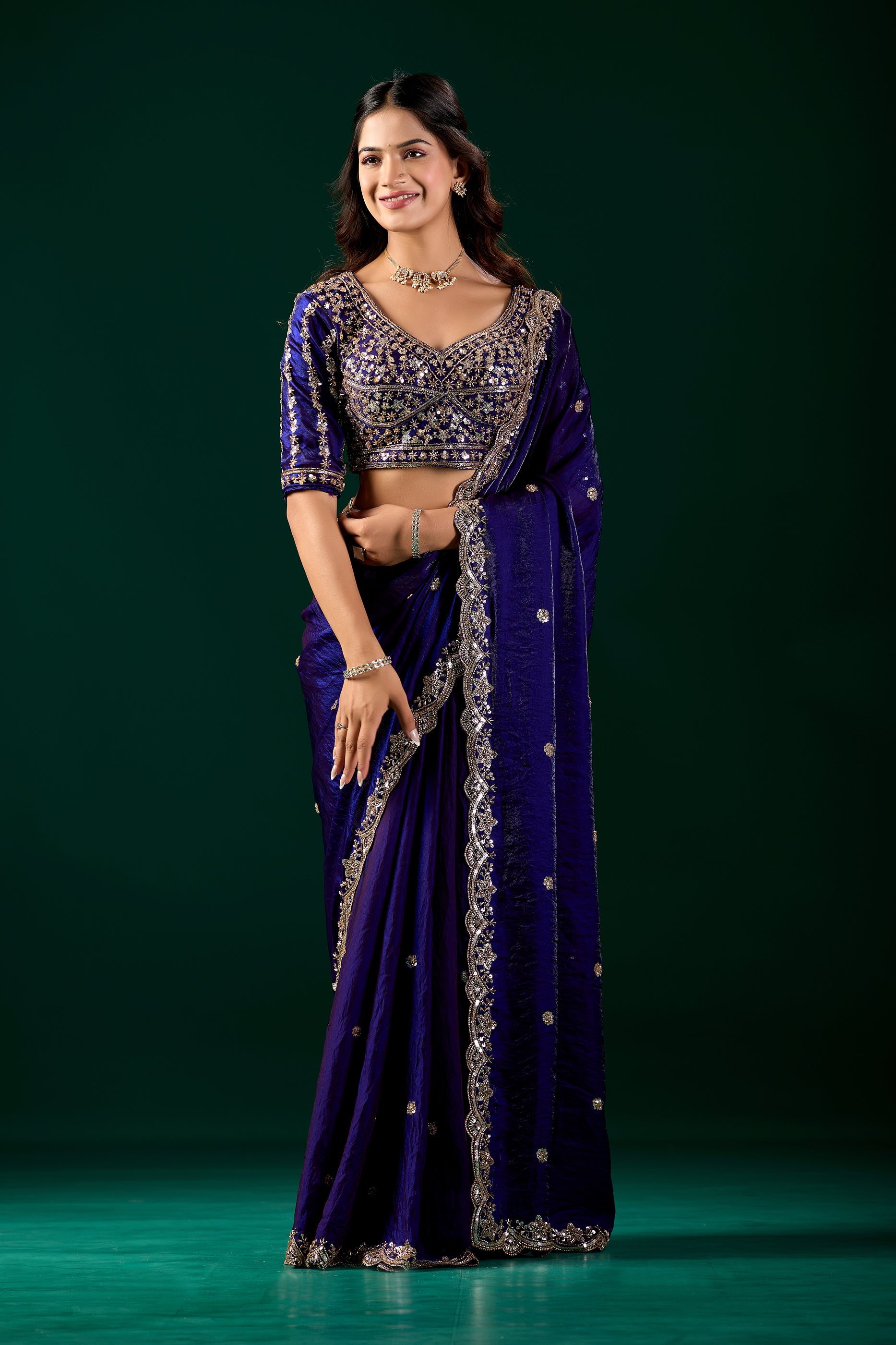Elegant full heavy blue saree with intricate cutdana work by Kanyaari, showcasing detailed embroidery and traditional design.