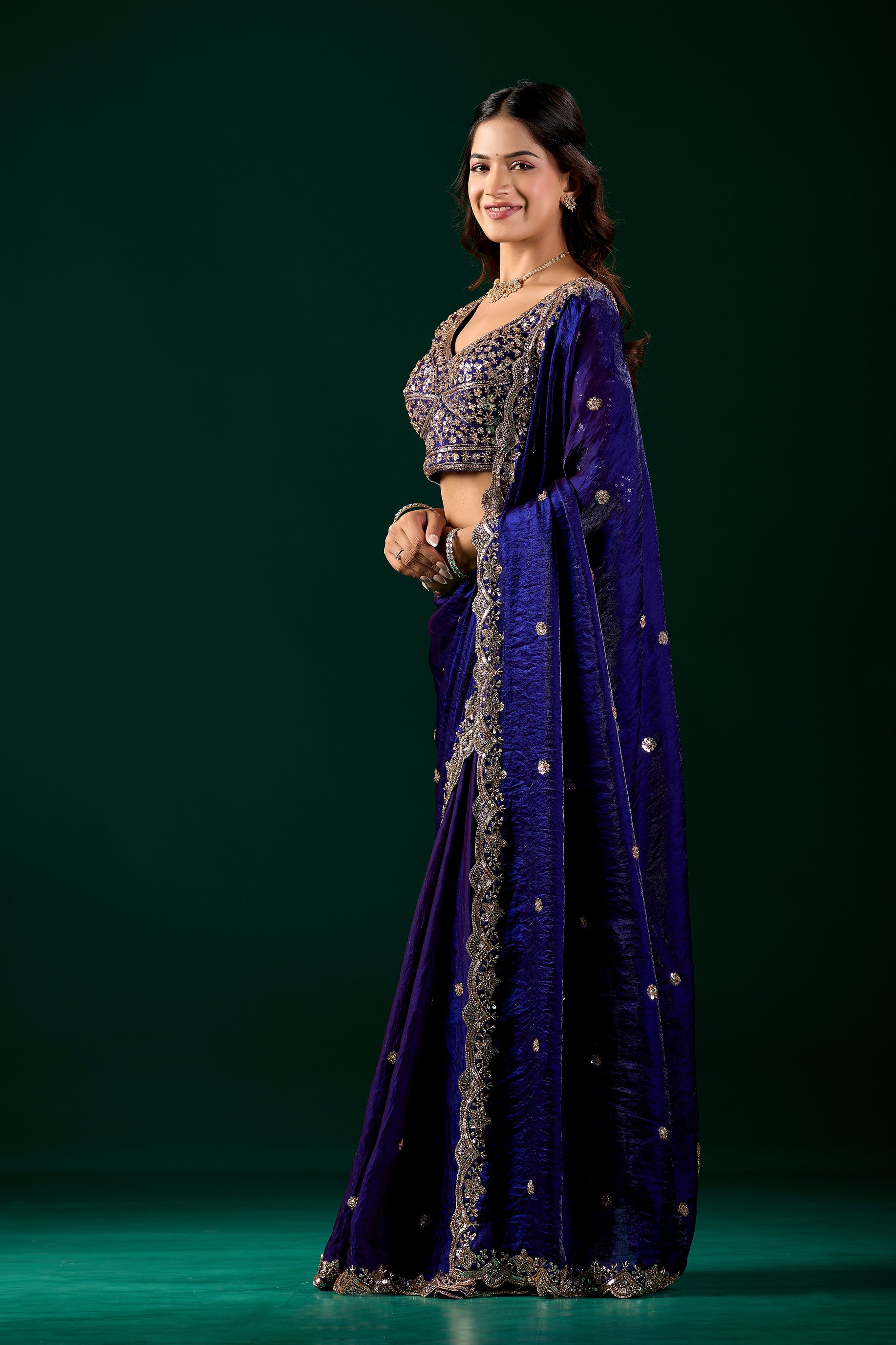 Blue heavy saree with intricate cutdana work from Kanyaari's Nora collection, showcasing detailed embroidery and traditional elegance.