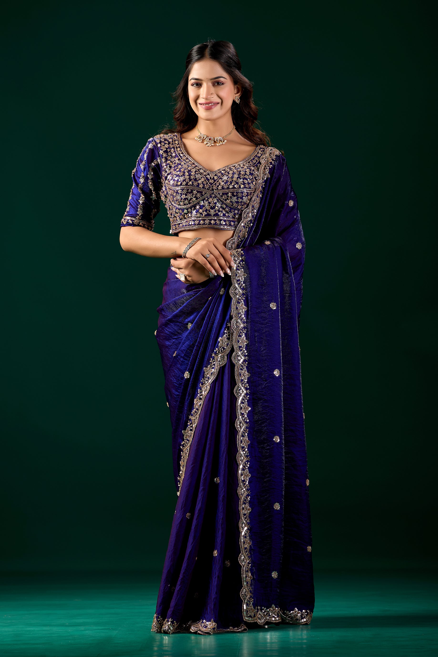 Blue heavy saree with cutdana work from Kanyaari, showcasing intricate embroidery and traditional Indian design.