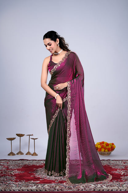 Kriti stylish wine-colored saree with intricate cutdana work from Kanyaari, draped elegantly showcasing detailed embroidery.