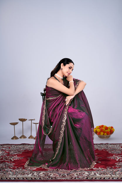Wine-colored Kriti saree by Kanyaari with elegant cutdana work, draped showcasing intricate embroidery and rich fabric details.