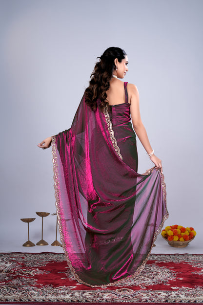 Wine-colored Kriti saree by Kanyaari featuring intricate cutdana work, draped elegantly with detailed craftsmanship.
