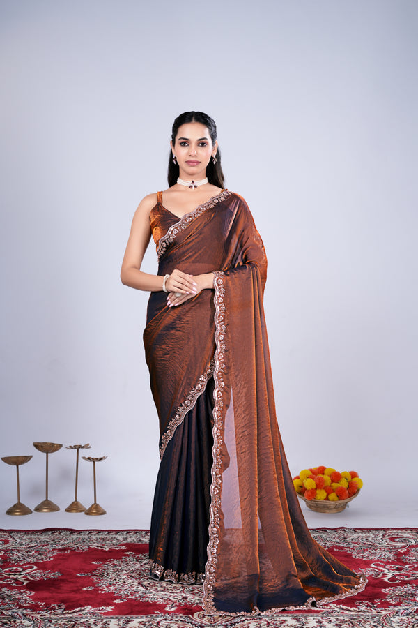 Kanyaari Kriti stylish brown saree with intricate cutdana work, flowing fabric and elegant drape, perfect for festive occasions.