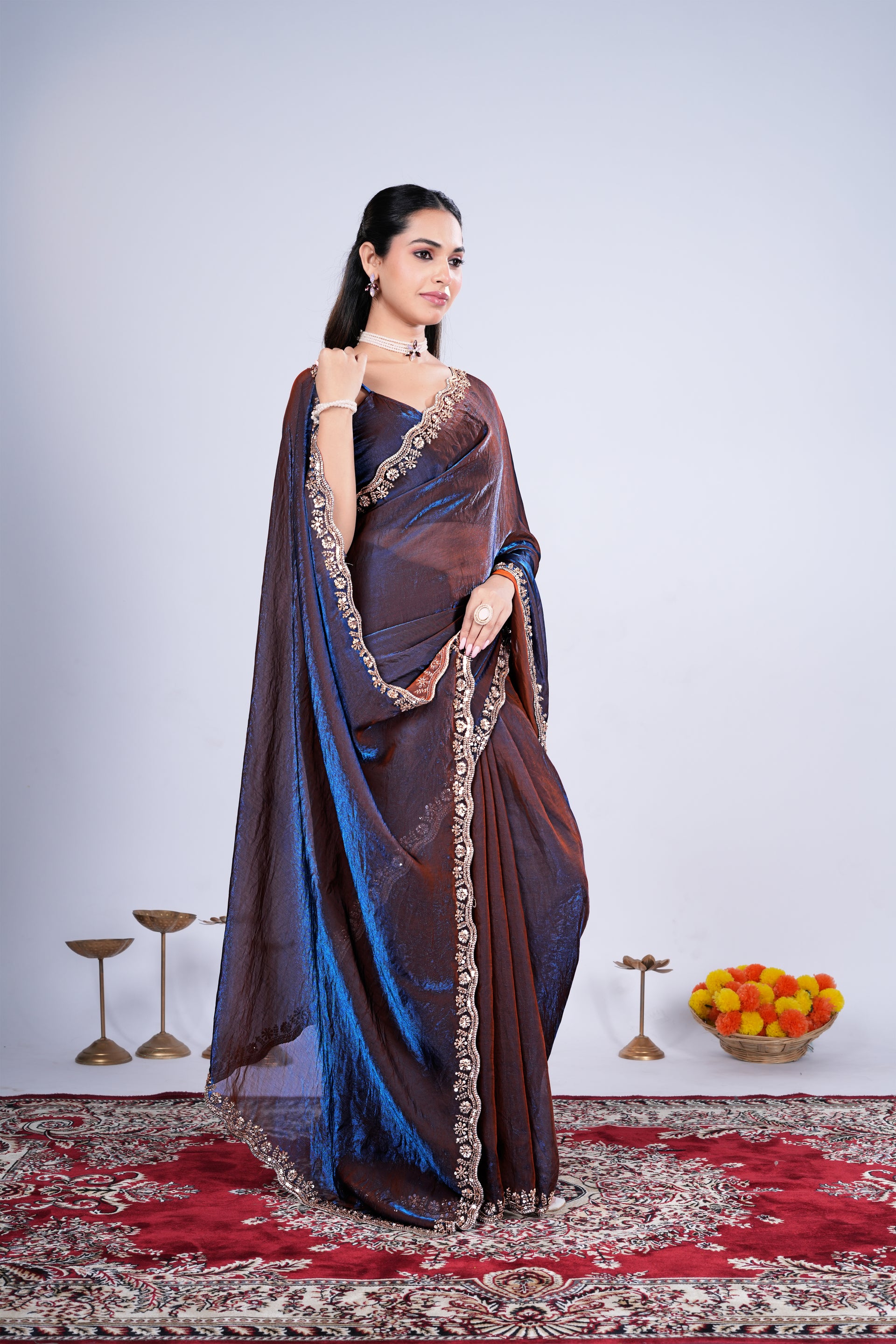Kanyaari Kriti blue saree with intricate cutdana work, featuring traditional embroidery and elegant draping for festive occasions.