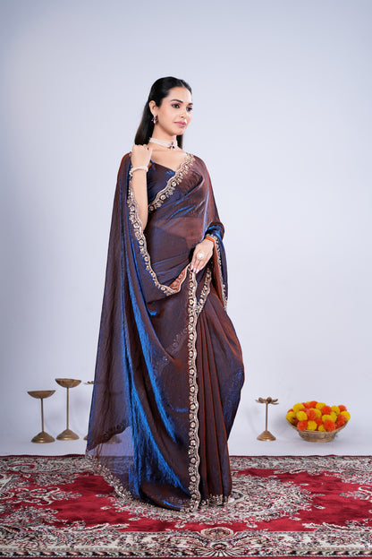 Kanyaari Kriti blue saree with intricate cutdana work, featuring traditional embroidery and elegant draping for festive occasions.