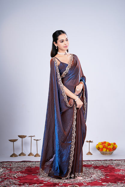 Blue Kriti stylish saree with intricate cutdana work from Kanyaari, showcasing elegant drape and detailed embellishments.