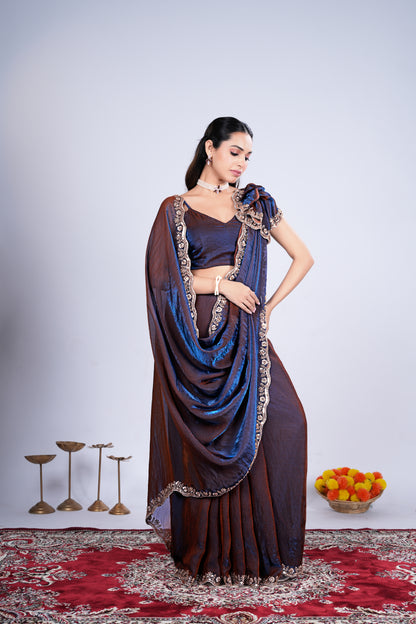 Blue Kriti stylish saree with intricate cutdana work from Kanyaari, featuring traditional design and elegant drape.