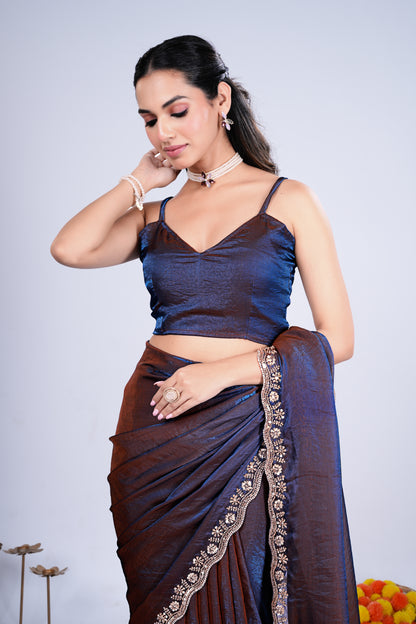 Blue Kriti stylish saree by Kanyaari featuring intricate cutdana work and elegant drape.