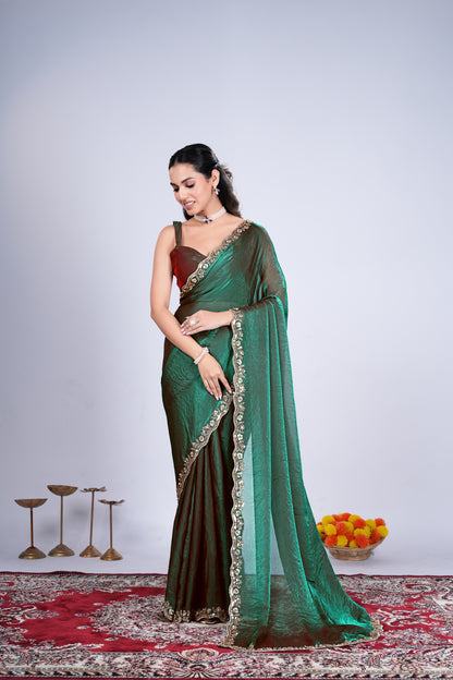 Green Kriti stylish saree with intricate cutdana work by Kanyaari, showcasing elegant drape and detailed craftsmanship.