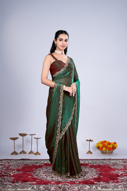 Kanyaari Kriti green saree with intricate cutdana work and elegant drape, showcasing traditional style and craftsmanship.