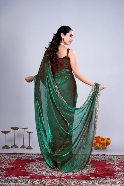 Kanyaari Kriti stylish green saree with intricate cutdana work, showcasing elegant traditional craftsmanship.