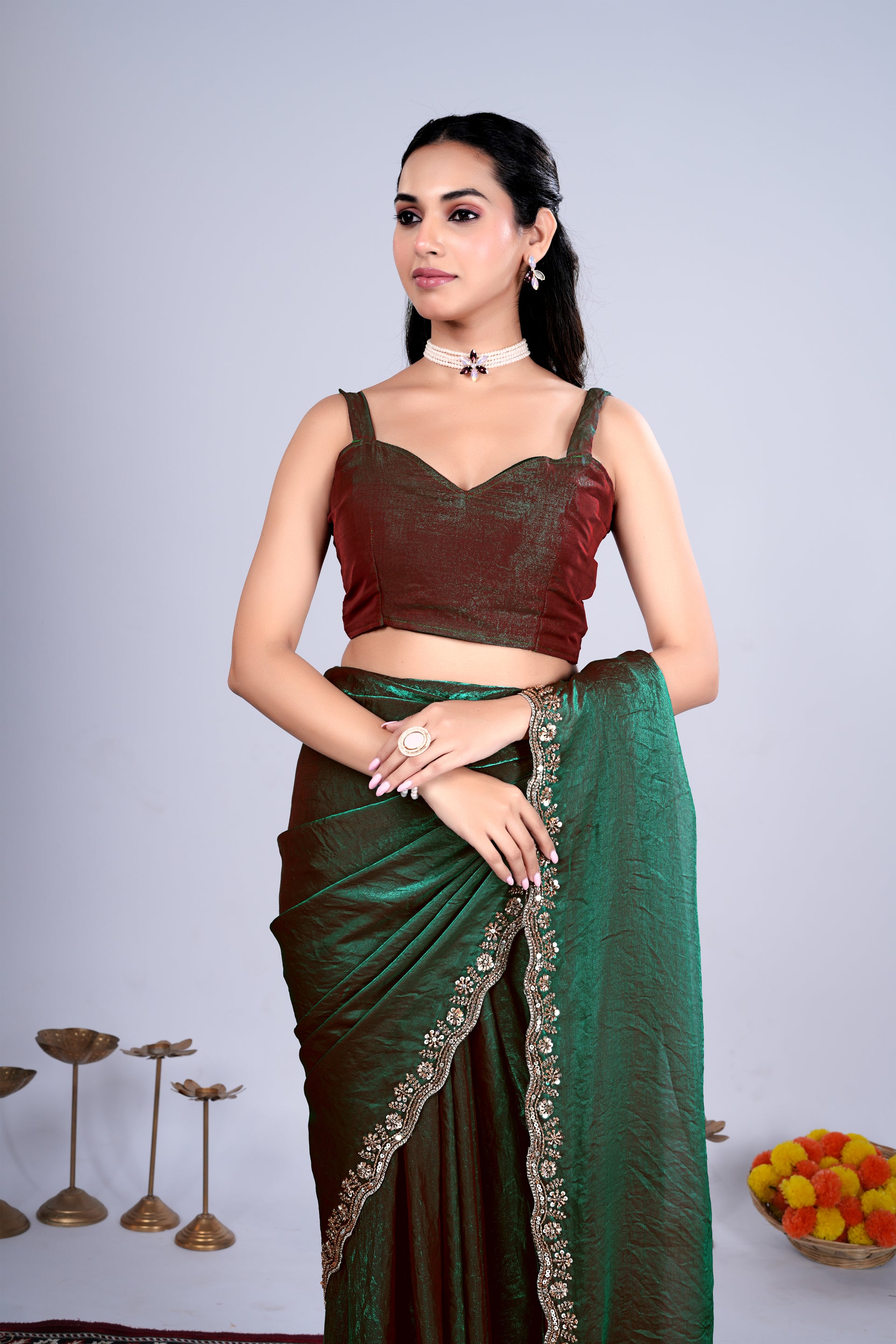 Kriti stylish green saree by Kanyaari with intricate cutdana work, showcasing elegant draping and detailed embroidery.