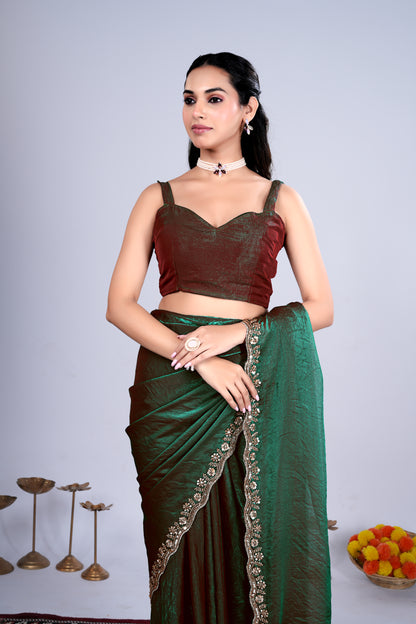 Kriti stylish green saree by Kanyaari with intricate cutdana work, showcasing elegant draping and detailed embroidery.