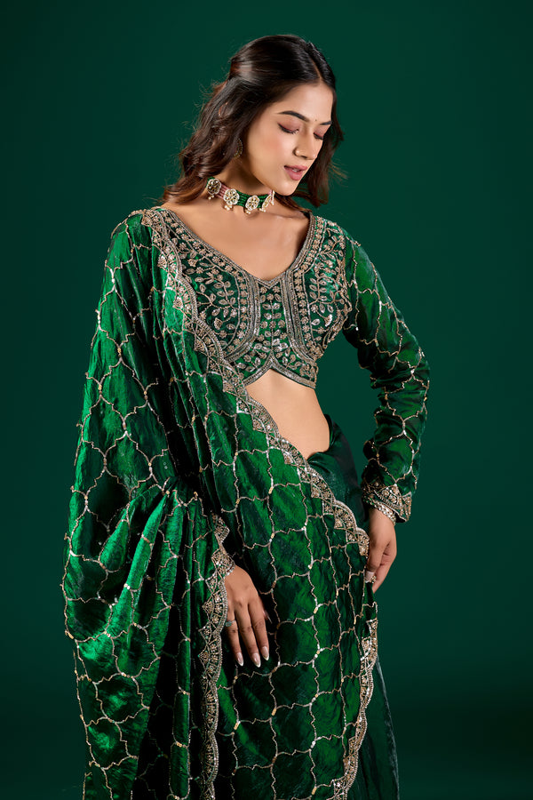 Elegant green silk saree with rose gold cutdana embroidery from Kanyaari's Barsana collection, showcasing intricate design details.